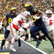 Hassan Haskins scores one of his five touchdowns against Ohio State.
